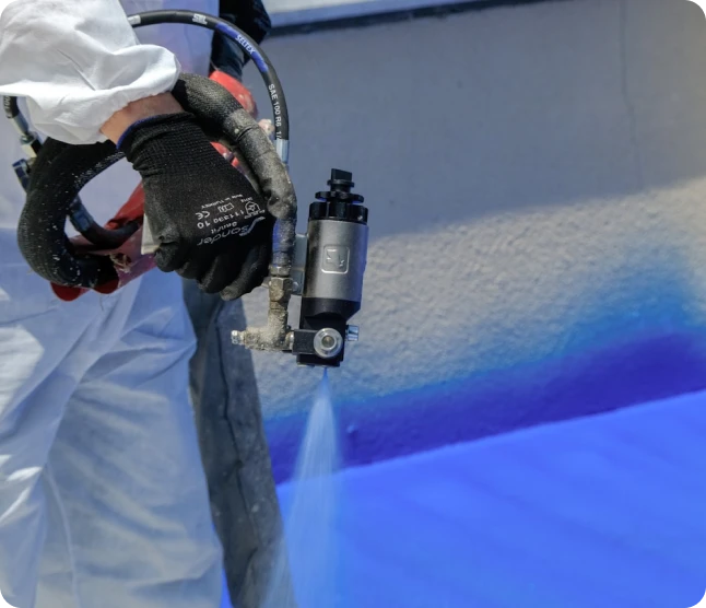 Spray foam insulation contractor at work
