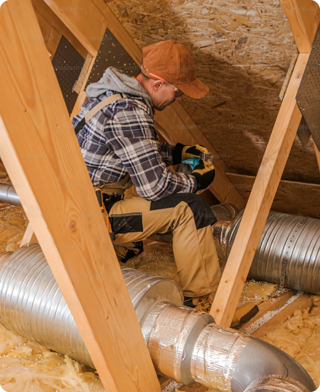 Spray foam insulation contractor at work