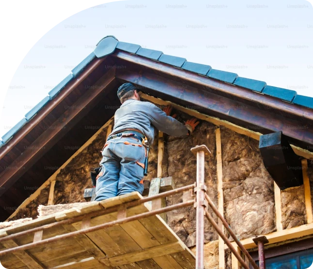 Spray foam insulation contractor at work