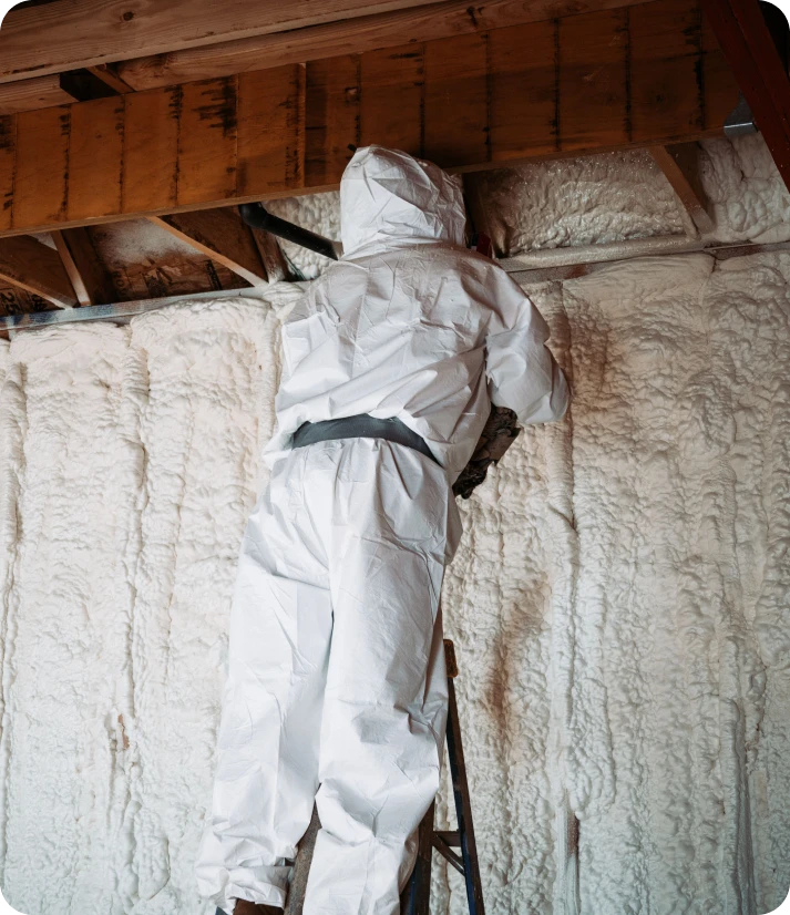 Spray foam insulation contractor at work