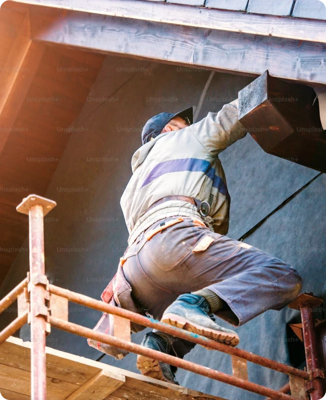 Spray foam insulation contractor at work
