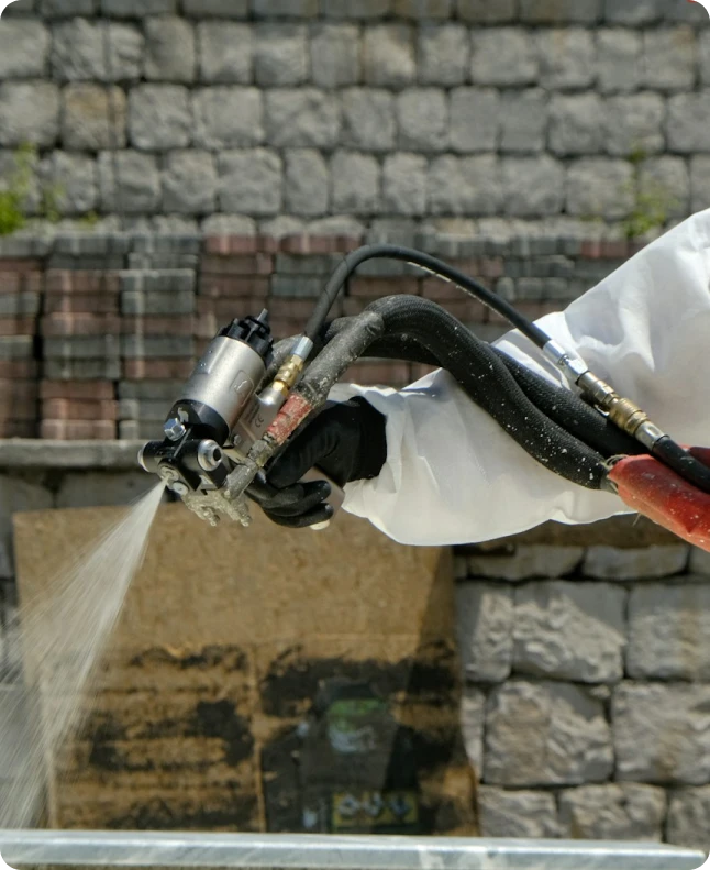Spray foam insulation contractor at work