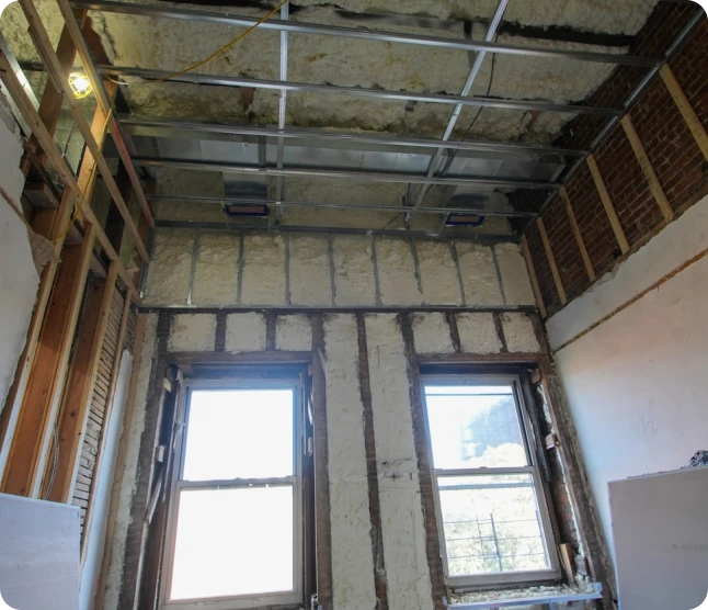 Spray foam insulation contractor at work