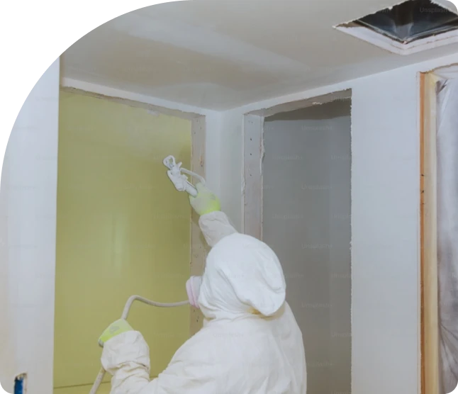 Spray foam insulation contractor at work