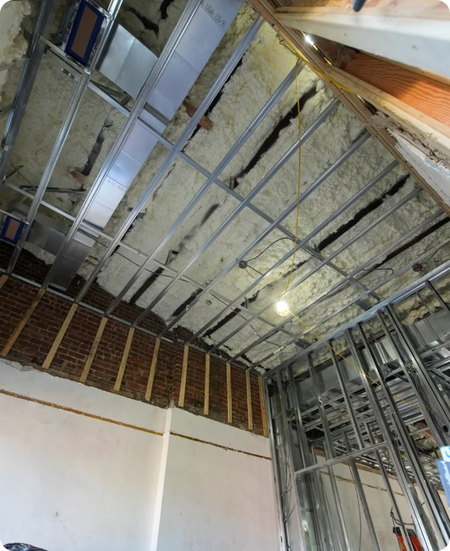 Spray foam insulation contractor at work