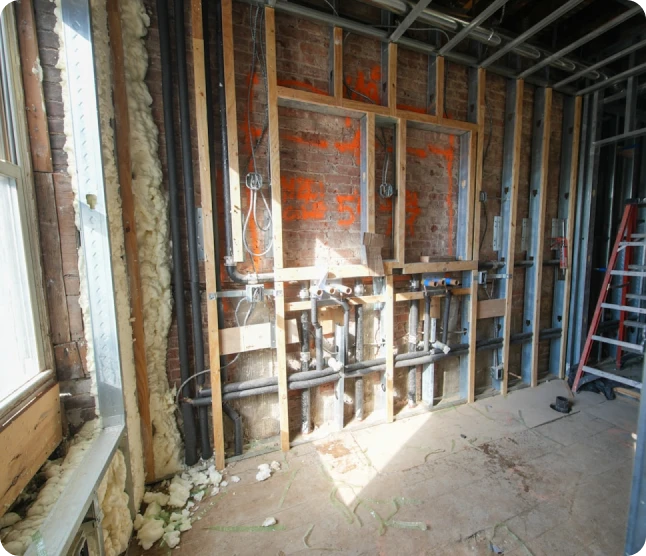 Wall insulation contractor at work
